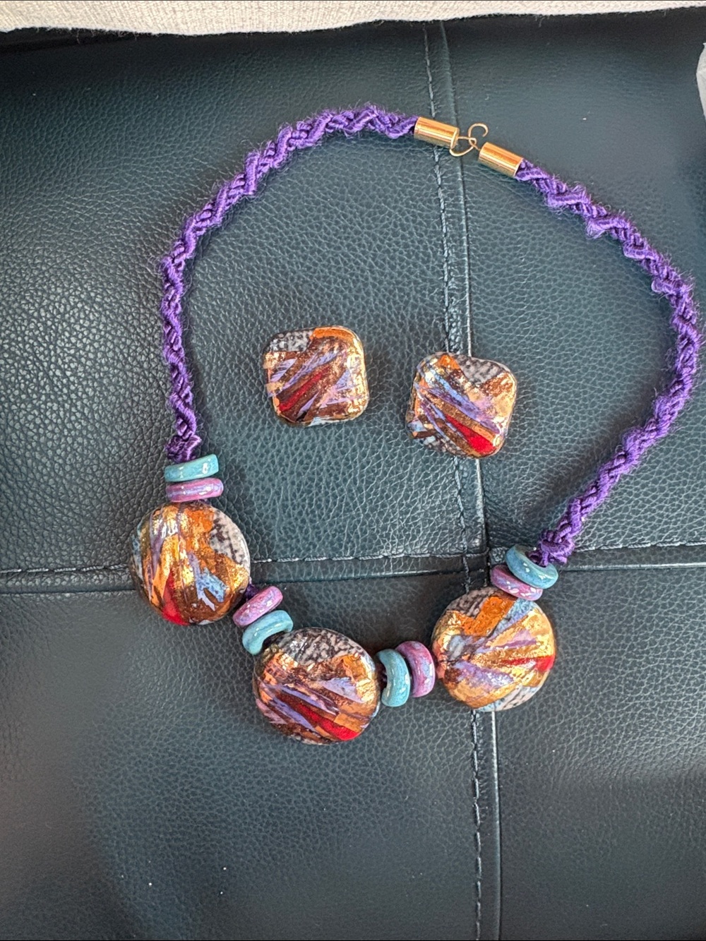 Beautiful mixed media ceramic earrings. These could be Kristine Marie.